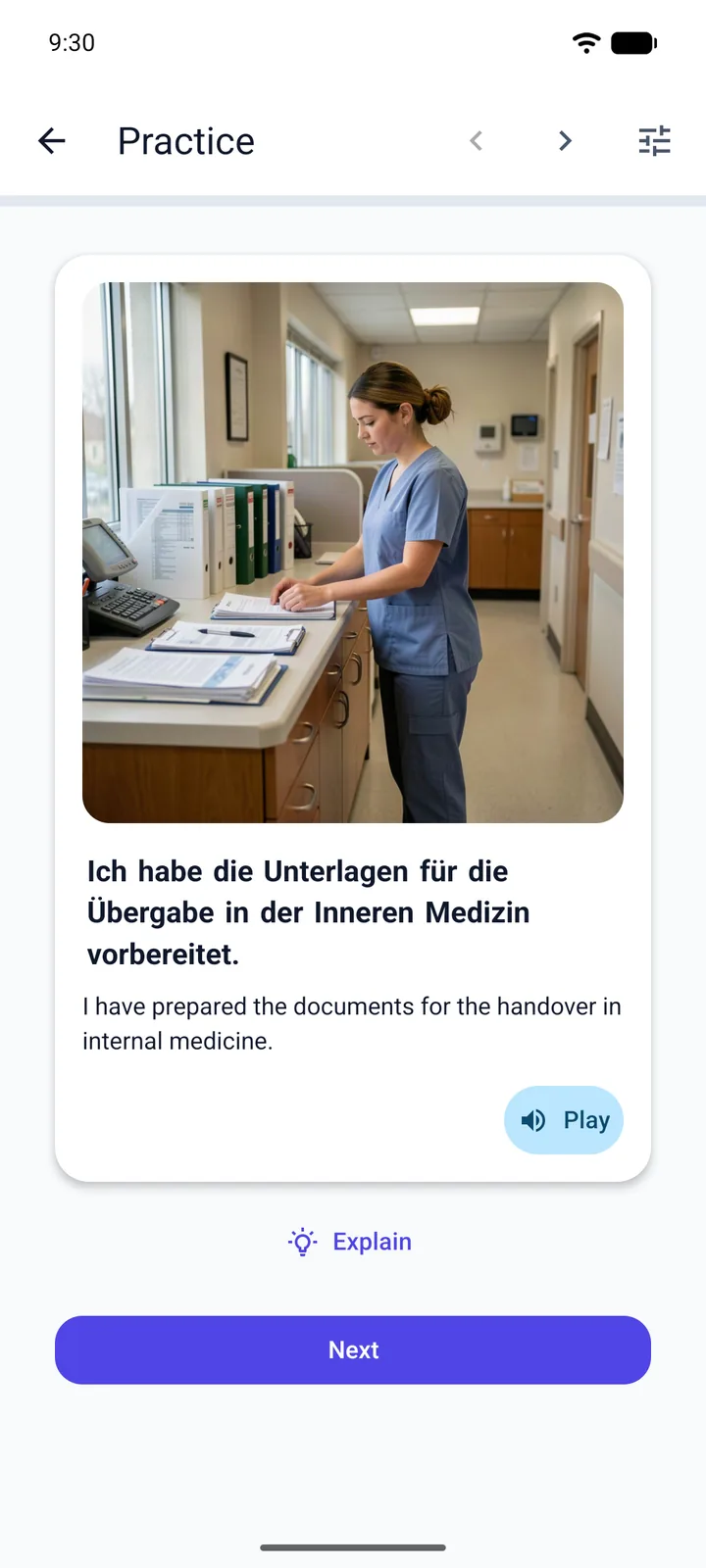 A Viglot scenario card with the app interface in English: a nurse in blue scrubs sorting handover paperwork at a ward nurses’ station, the German sentence “Ich habe die Unterlagen für die Übergabe in der Inneren Medizin vorbereitet.” and its English translation, with Play, Explain and Next buttons